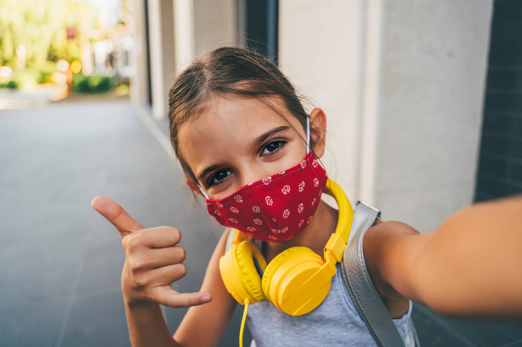 Girl happy with a mask